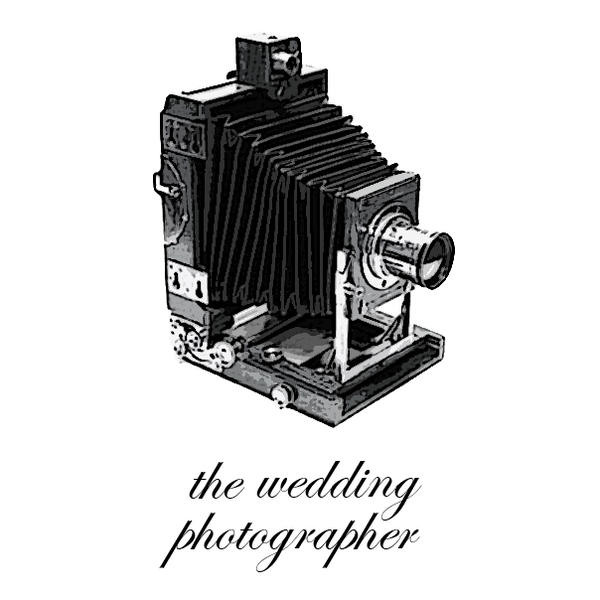 The Wedding Photographer
